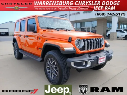 Orange 2025 Jeep Wrangler Sahara for sale in Warrensburg, MO