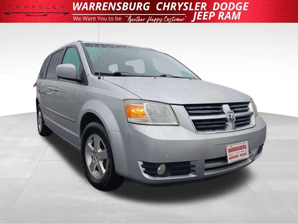 Used 2010 Dodge Grand Caravan SXT with VIN 2D4RN5D1XAR197133 for sale in Kansas City