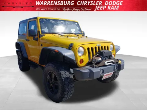 Yellow 2011 Jeep Wrangler Sport for sale in Warrensburg, MO