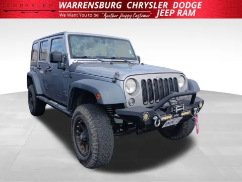 Silver 2015 Jeep Wrangler Unlimited Sport for sale in Warrensburg, MO