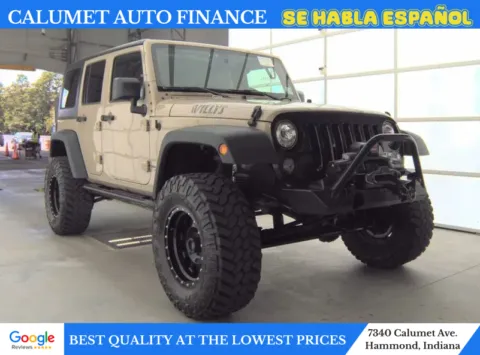 Beige 2017 Jeep Wrangler Unlimited Willys Wheeler Sport Utility 4D for sale in Hammond, IN