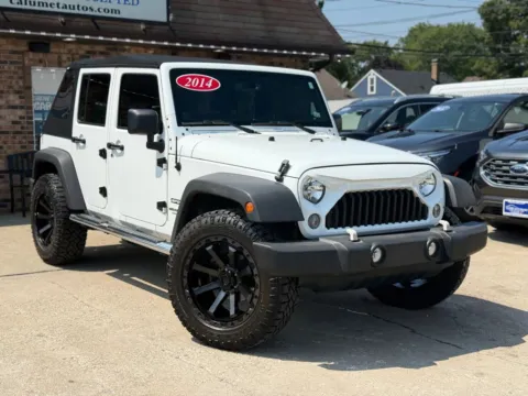 Photos of 2014 Jeep Wrangler Unlimited Sport SUV 4D for sale in Hammond, IN at Calumet Auto Finance