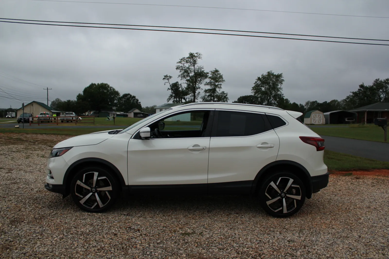 White 2021 Nissan Rogue Sport SL for sale in Spout Spring, VA