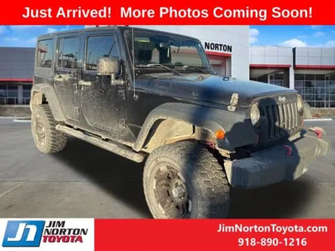 Black 2013 Jeep Wrangler Unlimited Sport for sale in Tulsa, OK