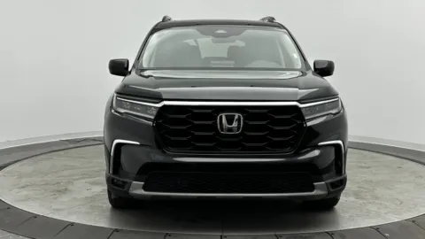 Photos of 2024 Honda Pilot Touring for sale in Jacksonville, FL at Auto Boutique Florida