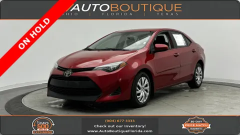 Red 2019 Toyota Corolla LE for sale in Jacksonville, FL