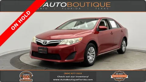 Red 2013 Toyota Camry LE for sale in Jacksonville, FL