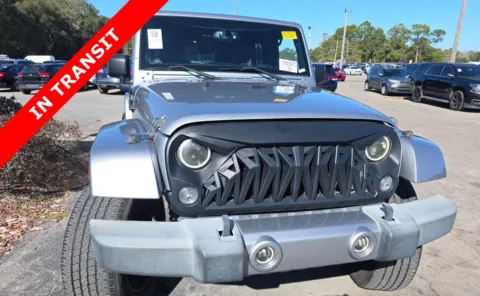 Another view of 2016 Jeep Wrangler Unlimited Sahara for sale in Jacksonville, FL at Auto Boutique Florida