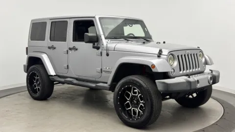 Another view of 2016 Jeep Wrangler Unlimited Sahara for sale in Jacksonville, FL at Auto Boutique Florida