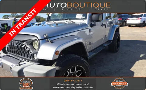 Silver 2016 Jeep Wrangler Unlimited Sahara for sale in Jacksonville, FL