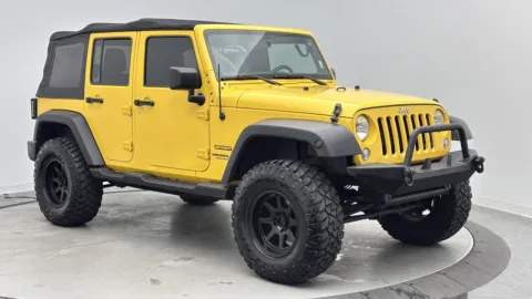 Another view of 2015 Jeep Wrangler Unlimited Sport for sale in Jacksonville, FL at Auto Boutique Florida