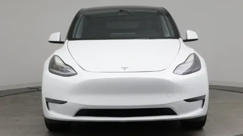Photos of 2023 Tesla Model Y for sale in Jacksonville, FL at Auto Boutique Florida