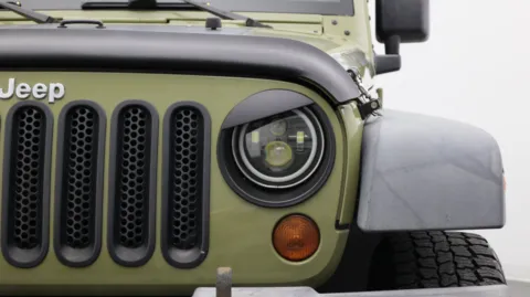 More photos of 2013 Jeep Wrangler Unlimited Sport at Auto Boutique Florida, FL