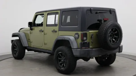 Photos of 2013 Jeep Wrangler Unlimited Sport for sale in Jacksonville, FL at Auto Boutique Florida
