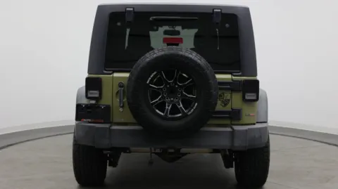 Another view of 2013 Jeep Wrangler Unlimited Sport for sale in Jacksonville, FL at Auto Boutique Florida