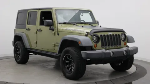 Another view of 2013 Jeep Wrangler Unlimited Sport for sale in Jacksonville, FL at Auto Boutique Florida