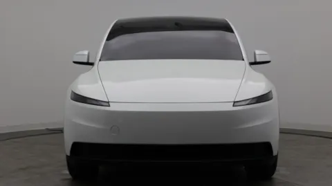Photos of 2026 Tesla Model Y for sale in Jacksonville, FL at Auto Boutique Florida