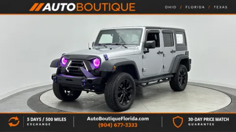 Silver 2015 Jeep Wrangler Unlimited Sport for sale in Jacksonville, FL