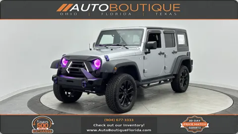 Silver 2015 Jeep Wrangler Unlimited Sport for sale in Jacksonville, FL