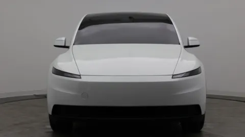 Photos of 2026 Tesla Model Y for sale in Jacksonville, FL at Auto Boutique Florida