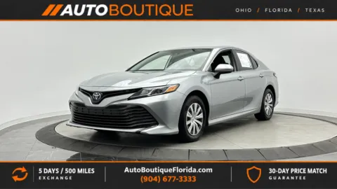 Silver 2019 Toyota Camry Hybrid LE for sale in Jacksonville, FL