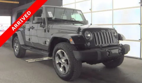 Another view of 2016 Jeep Wrangler Unlimited Sahara for sale in Jacksonville, FL at Auto Boutique Florida