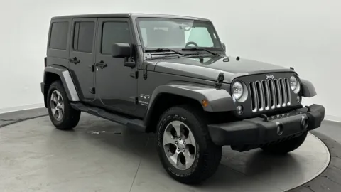 Another view of 2016 Jeep Wrangler Unlimited Sahara for sale in Jacksonville, FL at Auto Boutique Florida