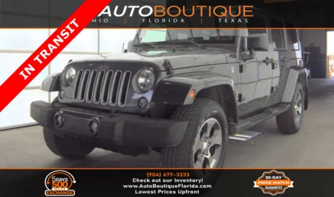 Gray 2016 Jeep Wrangler Unlimited Sahara for sale in Jacksonville, FL