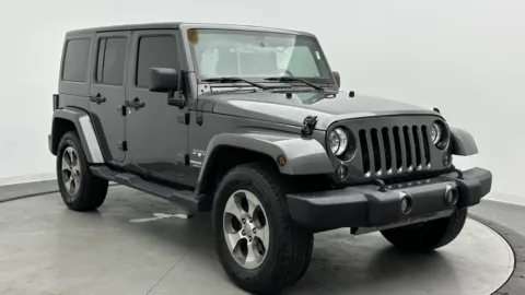 Another view of 2016 Jeep Wrangler Unlimited Sahara for sale in Jacksonville, FL at Auto Boutique Florida