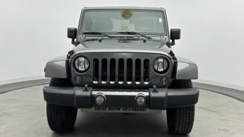 Photos of 2016 Jeep Wrangler Unlimited Sahara for sale in Jacksonville, FL at Auto Boutique Florida