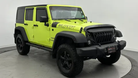 Another view of 2017 Jeep Wrangler Unlimited Sport for sale in Jacksonville, FL at Auto Boutique Florida