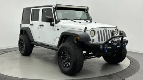 Another view of 2017 Jeep Wrangler Unlimited Sport for sale in Jacksonville, FL at Auto Boutique Florida