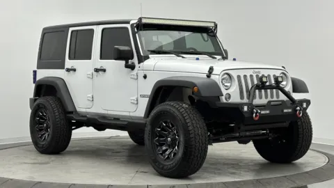 Another view of 2017 Jeep Wrangler Unlimited Sport for sale in Jacksonville, FL at Auto Boutique Florida