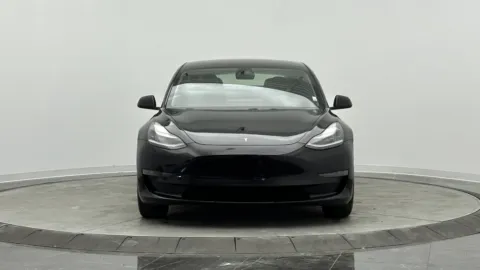 Photos of 2021 Tesla Model 3 Standard Range Plus for sale in Jacksonville, FL at Auto Boutique Florida