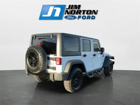 Another view of 2015 Jeep Wrangler Unlimited Willys for sale in Broken Arrow, OK at Jim Norton Ford