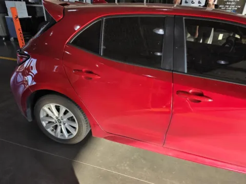 Red 2023 Toyota Corolla Hatchback SE for sale in Oklahoma City, OK