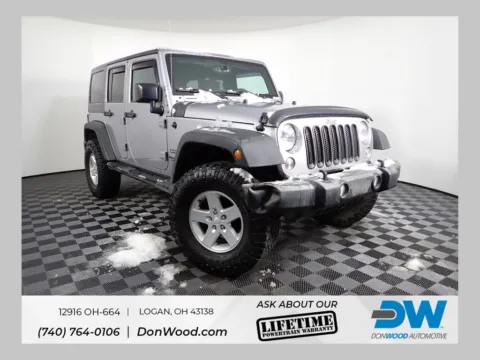 Silver 2016 Jeep Wrangler Unlimited Sport for sale in Logan, OH