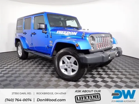 Blue 2014 Jeep Wrangler Unlimited Freedom Edition for sale in Logan, OH