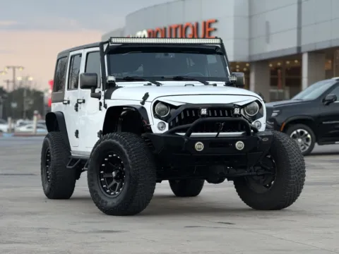 Photos of 2017 Jeep Wrangler Unlimited Sport for sale in Alvin, TX at Auto Boutique Texas