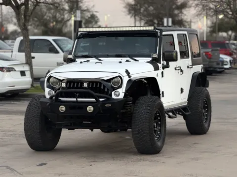 Another view of 2017 Jeep Wrangler Unlimited Sport for sale in Alvin, TX at Auto Boutique Texas