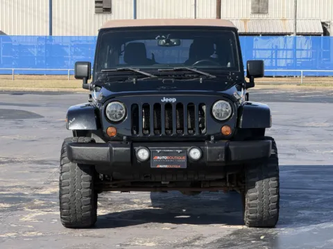 More photos of 2013 Jeep Wrangler Unlimited Sahara at Auto Boutique Texas, TX