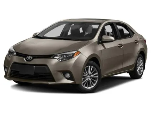 White 2015 Toyota Corolla LE for sale in Alvin, TX