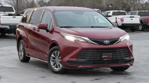 Red 2021 Toyota Sienna LE for sale in Alvin, TX