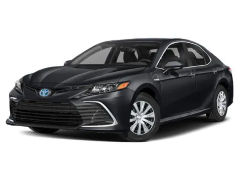White 2021 Toyota Camry Hybrid LE for sale in Alvin, TX