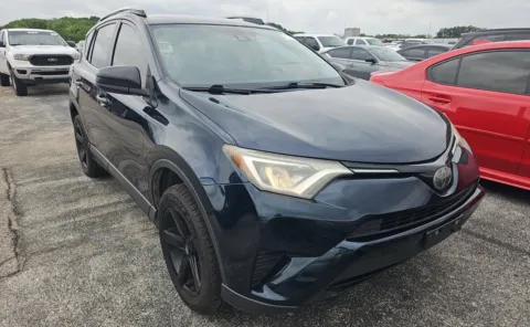 Blue 2018 Toyota RAV4 LE for sale in Alvin, TX