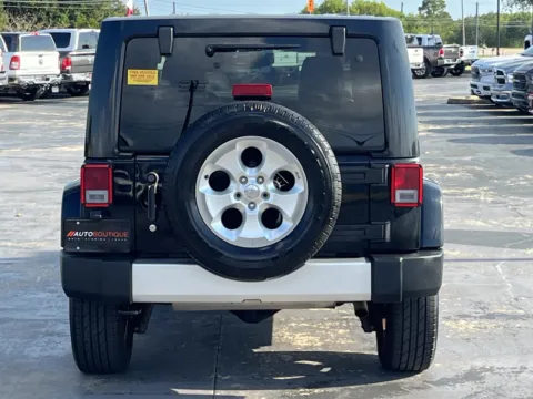 More photos of 2014 Jeep Wrangler Unlimited Sahara at Auto Boutique Texas, TX