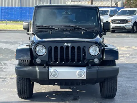 More photos of 2014 Jeep Wrangler Unlimited Sahara at Auto Boutique Texas, TX