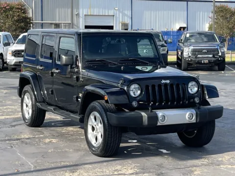 Another view of 2014 Jeep Wrangler Unlimited Sahara for sale in Alvin, TX at Auto Boutique Texas