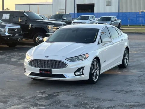 Photos of 2019 Ford Fusion Hybrid Titanium for sale in Alvin, TX at Auto Boutique Texas