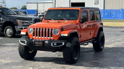 Orange 2018 Jeep Wrangler Unlimited Sahara for sale in Alvin, TX